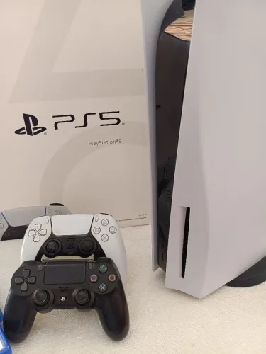 Playstation 5 + 1 controles+ 2 jogos;