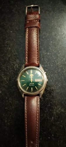 Relógio Orient 3 estrelas automático mostrador persiana verde com pulseira couro anos 80
