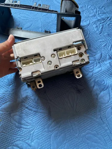 Vendo moldura e rádio Corolla 2003/2008