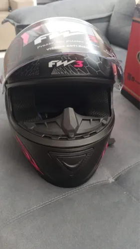 Vendo capacete top nunca usado 