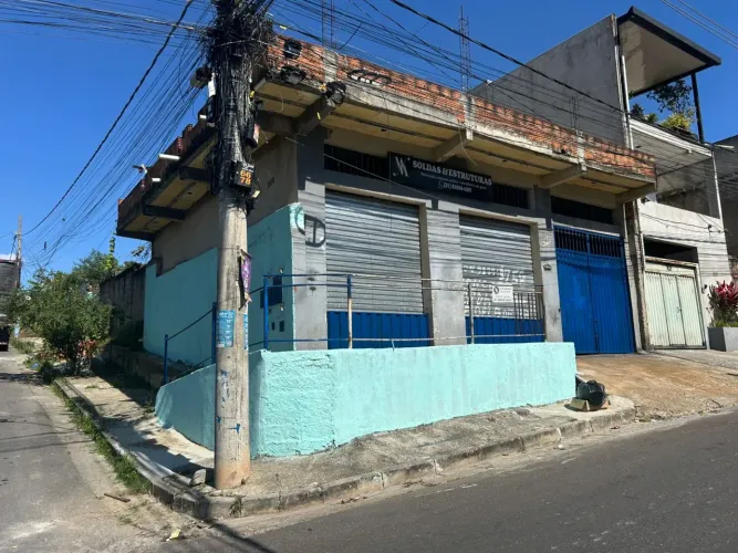 Vendo meio lote de Esquina sendo outra metade com plantação