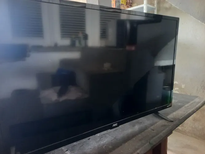 Tv 32 pol AOC roku tv