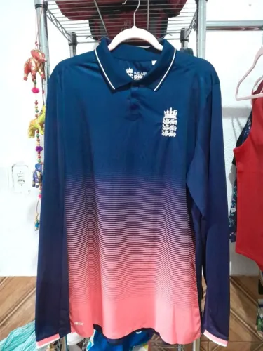 camisa polo new balance england cricket g nova