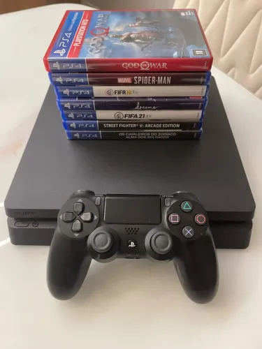 PS4 Slim 1TB - 1 controle e 7 jogos