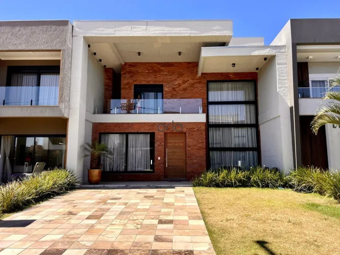 Casa à venda com 04 suítes e piscina privativa no Condomínio Blue em Xangri-Lá. REF: