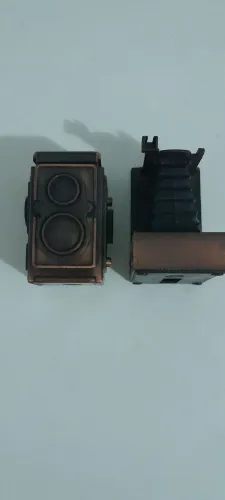 Miniaturas de máquina fotográfica antiga