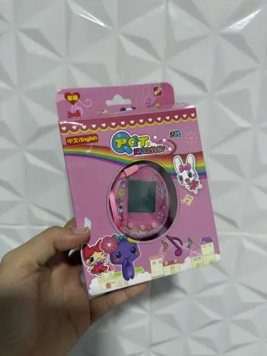Tamagotchi Qpet Recarregável roxo e rosa disponível