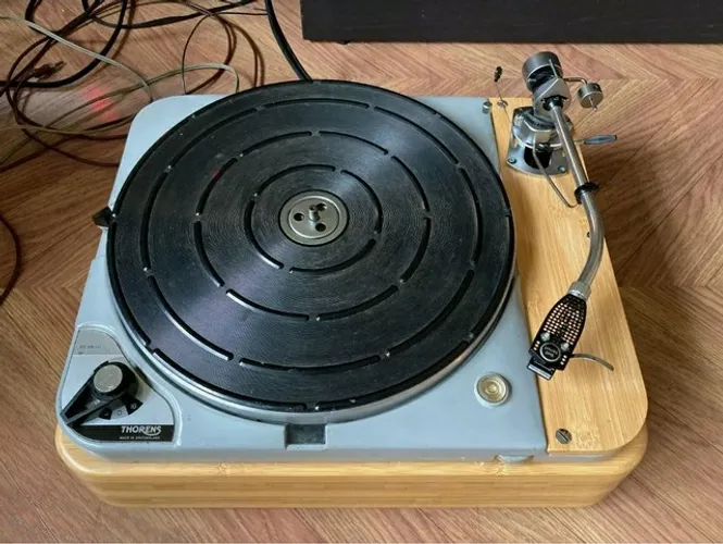 C. O. M. P. R. O. Thorens 124