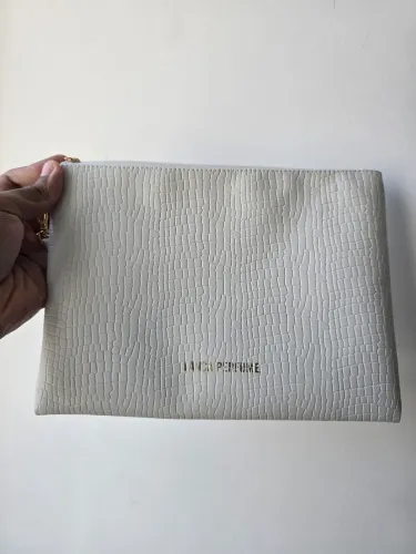 necessaire da marca lança perfume