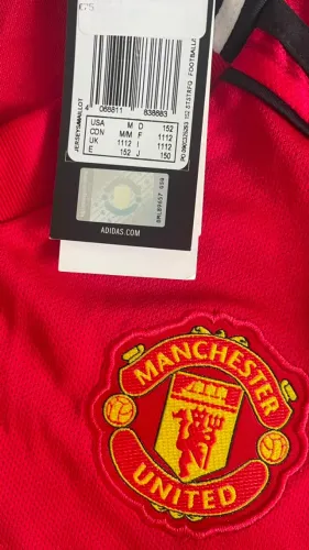 Camisa infantil titular Adidas do Manchester United - Original