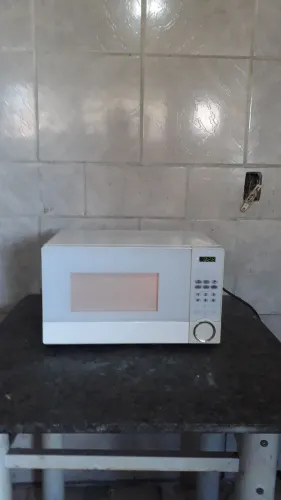 Microondas Midea 18 litros funcionando perfeitamente e ótimo estado de perfeitamente.