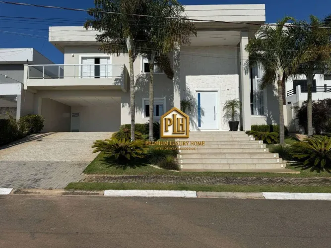 Casa com 4 dormitórios à venda, 430 m² por R$ 3.400.000,00 - Condomínio Shambala III - Ati