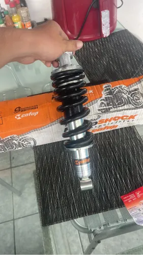 Amortecedor de Broos e Xre190 novo 