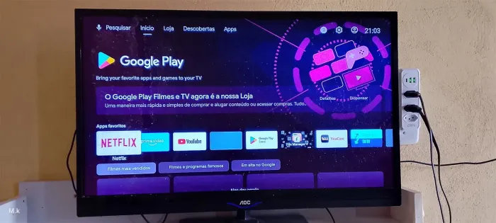 Televisão AOC + Xiaomi TV.
