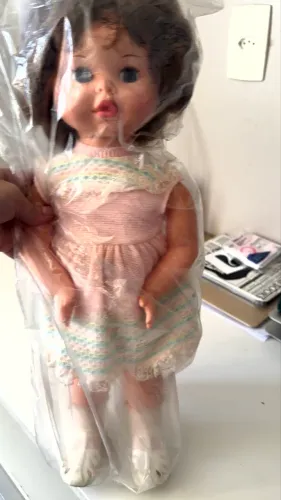 Boneca Bate Palminha na caixa