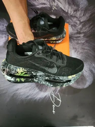 Tênis Nike Vomero Premium 42