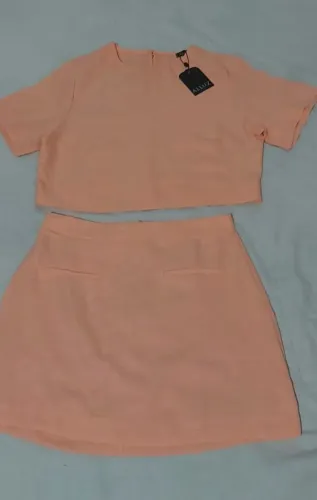 Conjunto Alluz cropped e saia curta salmon 34/36