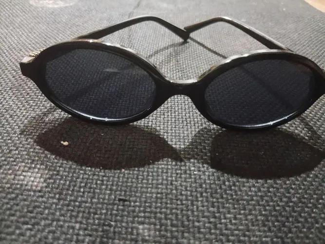 Vendo oculos miu miu modelo smu04z original  poças vezes usado