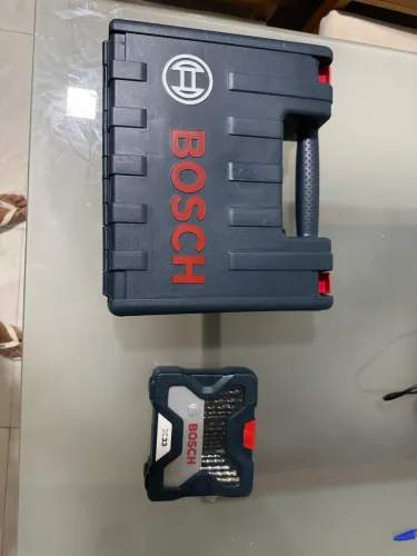 Furadeira impacto Bosch 850W 220V com 33 peças