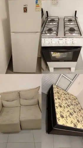Sofá, cama, geladeira e fogão