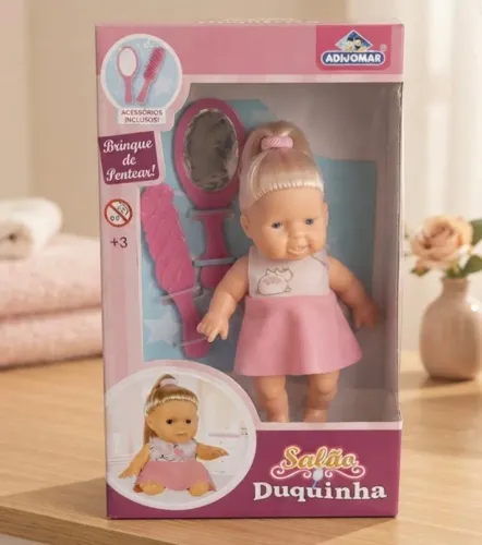 Boneca Duquinha Com Um Espelho E Uma Escova De Cabelo.