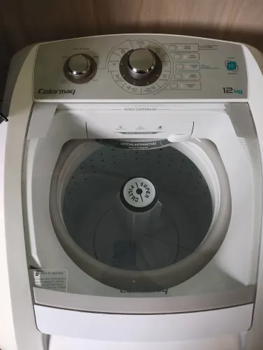 Máquina de lavar com defeito
