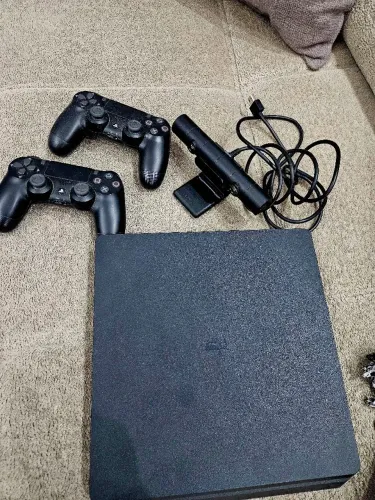 Playstation 4 slim 1tb com 12 jogos originais, com câmera em fifa 26