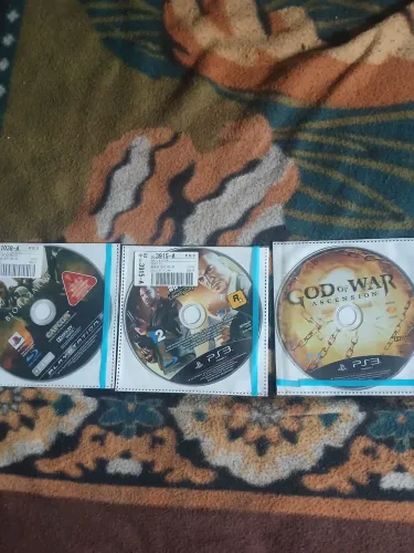Jogos de PS3 - God of War, GTA e Resident Evil 5