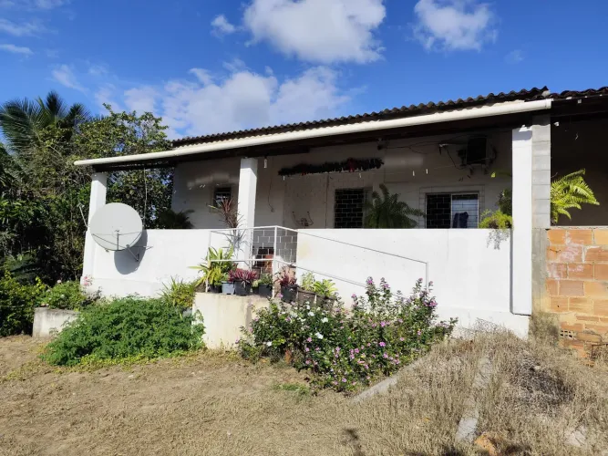 Terreno com 50x50 com duas casas