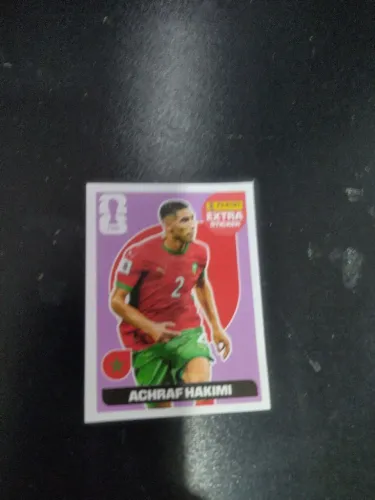 Figurinha Extra Sticker roxa (regular) do Achraf Hakimi da coleção Panini Copa 2026