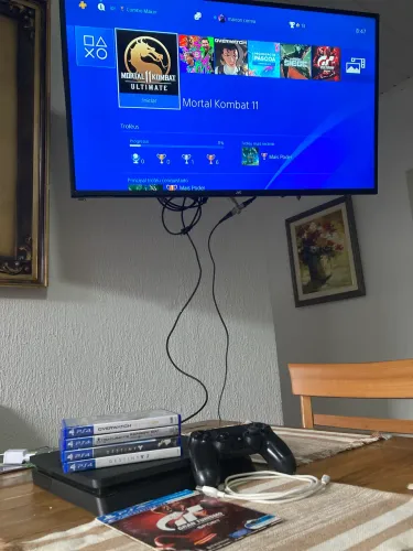 PS4 Slim + 5 Jogos Físicos + 2 Jogos digitais + Controle Original (Envio OLX PAY)