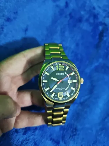 Relógio Orient dourado
