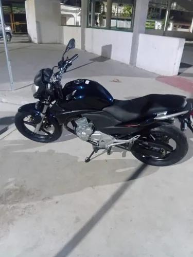 Moto em perfeito estado de conservação.