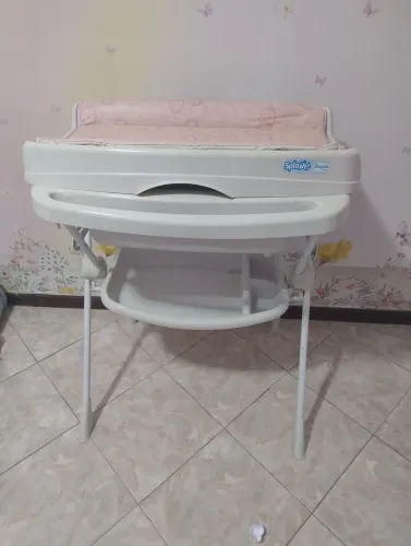 Banheira com trocador.