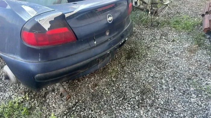 Aplica tampa de mala gm TIGRA 1999