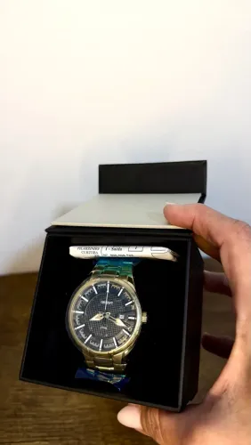 RELÓGIO ORIENTE ORIGINAL DOURADO MOSTRADOR PRETO NOVO E SEM USO
