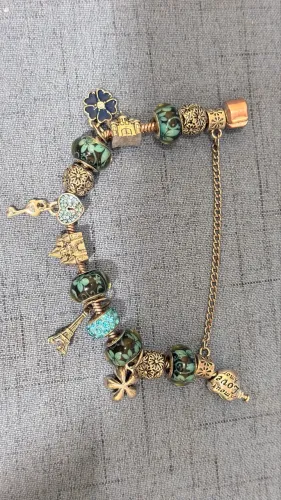 Pulseira com 4 berloque com numeração de prata