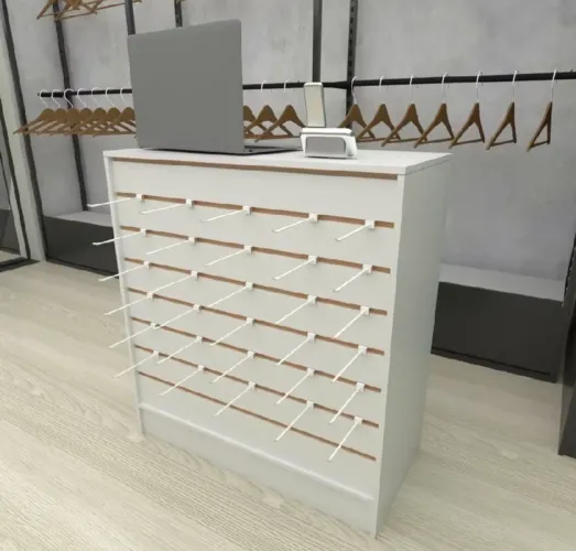 Balcão branco de loja, com painel canelado