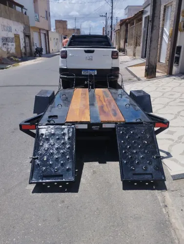 Reboque pra um quadriciclo ou três moto tel *63s