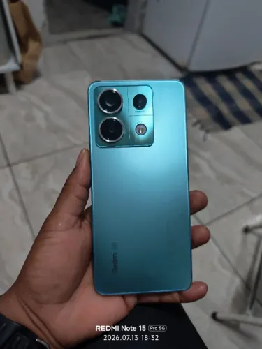 Smartphone redimi 13 pro 5g 256 gigas semi novo único dono poucas marcas de uso