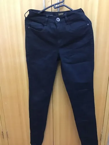 Calça preta Lança perfume