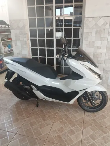 PCX troco por elite mais volta