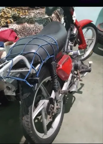 TRAXX 85 Cc moto muito boa mais com um simples defeito bobinado queimou mais é barato pra 