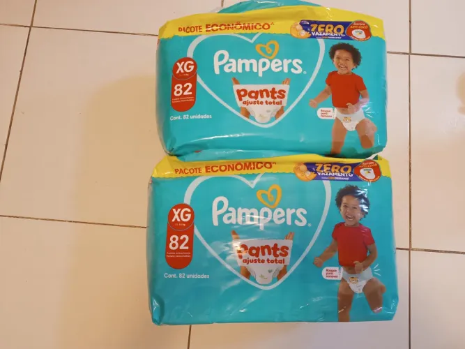 Fralda xg Pampers ajuste total shortinho