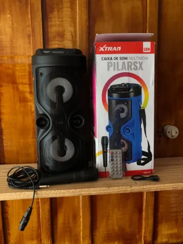 Vendo caixa de som nova nunca usado nova acompanha todos acessórios controle microfone