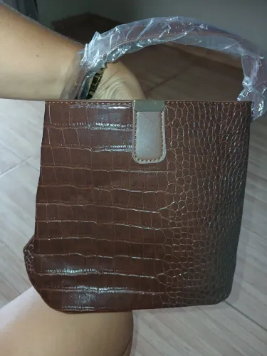 Bolsa de mão ? ou tira colo