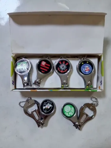 Cortador de unhas com abridor e lixa ( 3x1). Novo. Caixa C/12 unidades 