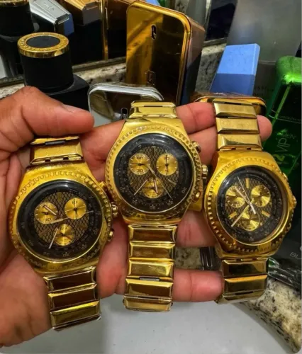 Relógio Swatch série ouro 
