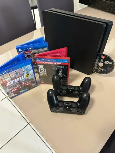 OPORTUNIDADE!!! PS4 SLIM 1 TERA + JOGOS + DUAS MANETES ORIGINAIS.