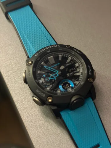 Relogio De Pulso Casio G-shock Anadi-ga-2000-1a2dr Correia Azul Bisel Preto Fundo Preto